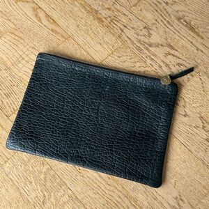 Clare V black leather textured clutch worn once perfect condition. It